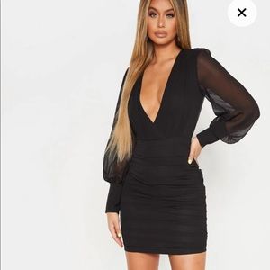 Black long sleeve ruched dress